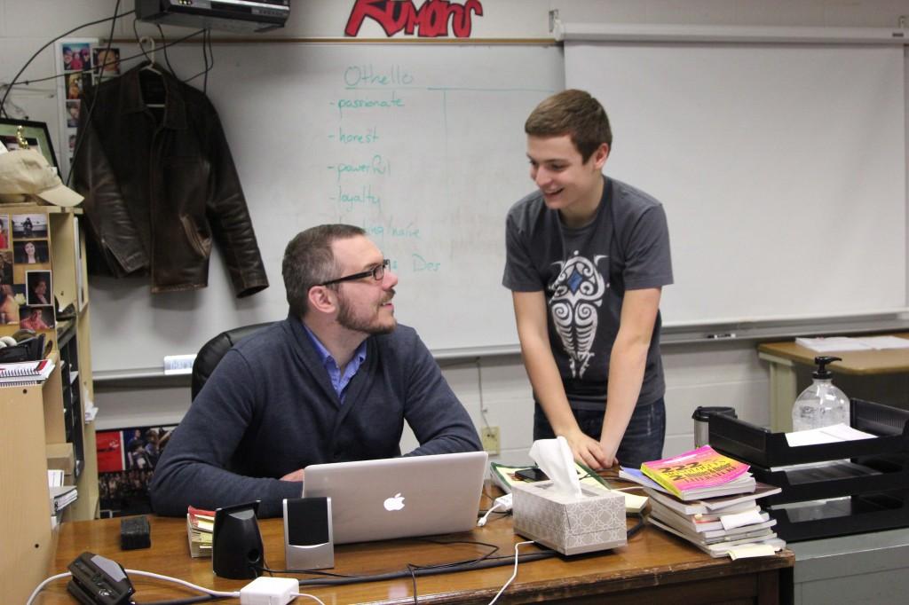 Theater+instructor+Jeremy+Stoll+talks+with+Sophomore+Zach+Bowen+about+the+upcoming+plans+for+the+theater+department.+Stoll+was+named+teacher+of+the+year+at+the+Nebraska+Thespians+Festival+on+Saturday%2C+Jan.+11.+