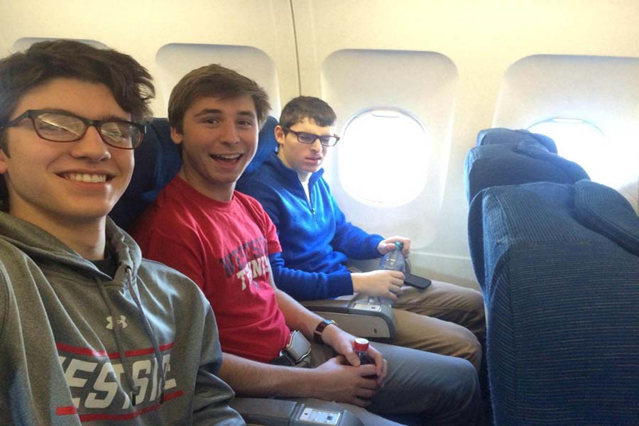 Juniors Aren Rendell, Tom Kutilek and Max Slosburg, three of the six students going to Harvard Model Congress, on the plane en route to Boston. The other three students are juniors Danny Coyle, Tyler Schneiderman and Reece Watanabe. The group is accompanied by social studies instructor Jon Preister. Photo courtesy of Aren Rendell
