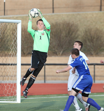 Senior Quinn Nelson jumps to make a save to keep the score tied 2-2 and force the game into overtime.