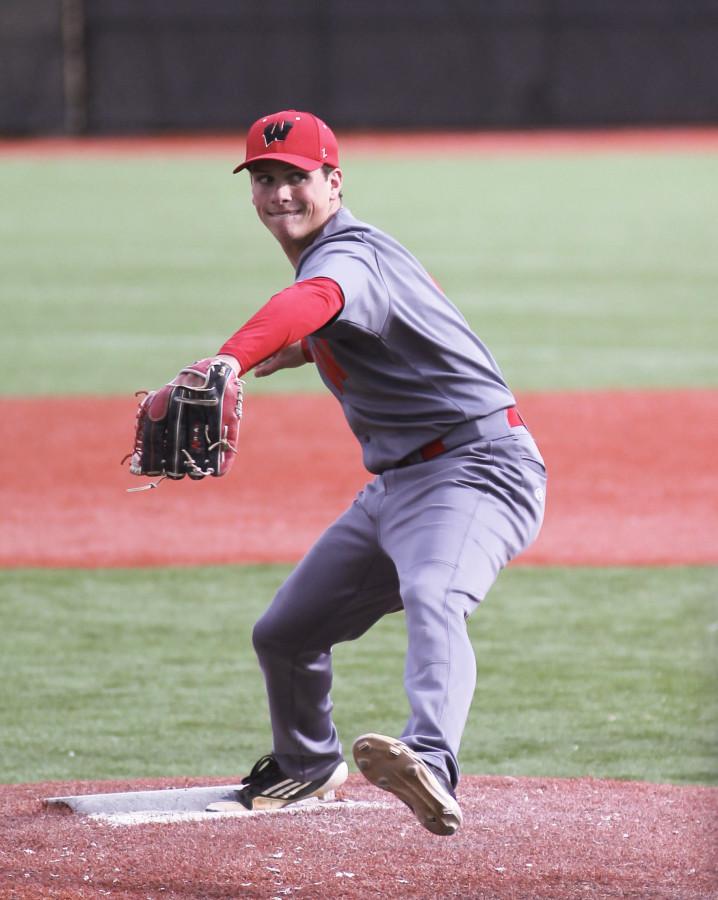 Luke Biggs pitches for the Warriors during the Metro tournament.