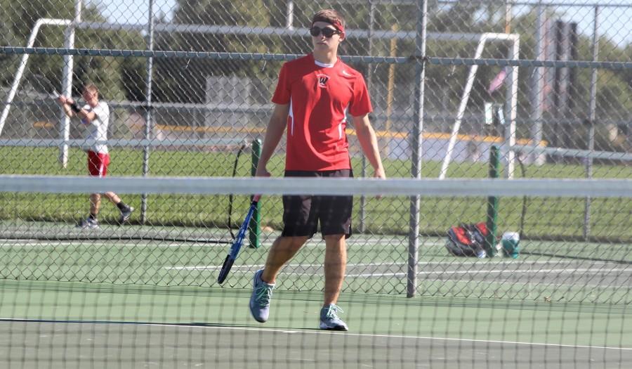Varsity tennis captain Max Slosburg competes against Millard South at No. 2 singles. Slosburg will be providing tennis updates throughout the year. Photo by Aren Rendell