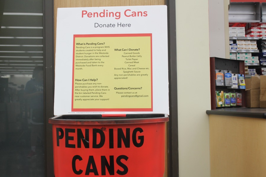 The+donation+bin+for+Pending+Cans+is+located+next+to+the+customer+service+counter+at+Hy-Vee.+The+project+started+in+Honors+Literature+with+the+Community+Based+Learning+project.+