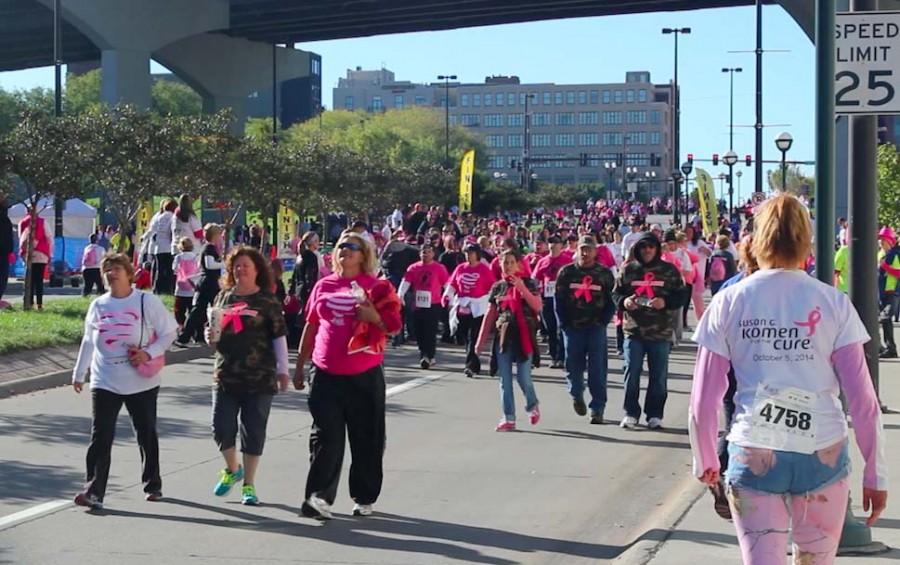 Each year Race for the Cure attracts thousands of people from around Nebraska. Breast cancer survivors can be recognized by the pink shirts they wear. Photo by Maddie Beda