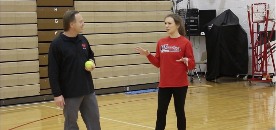 Student coaches little sister's softball team