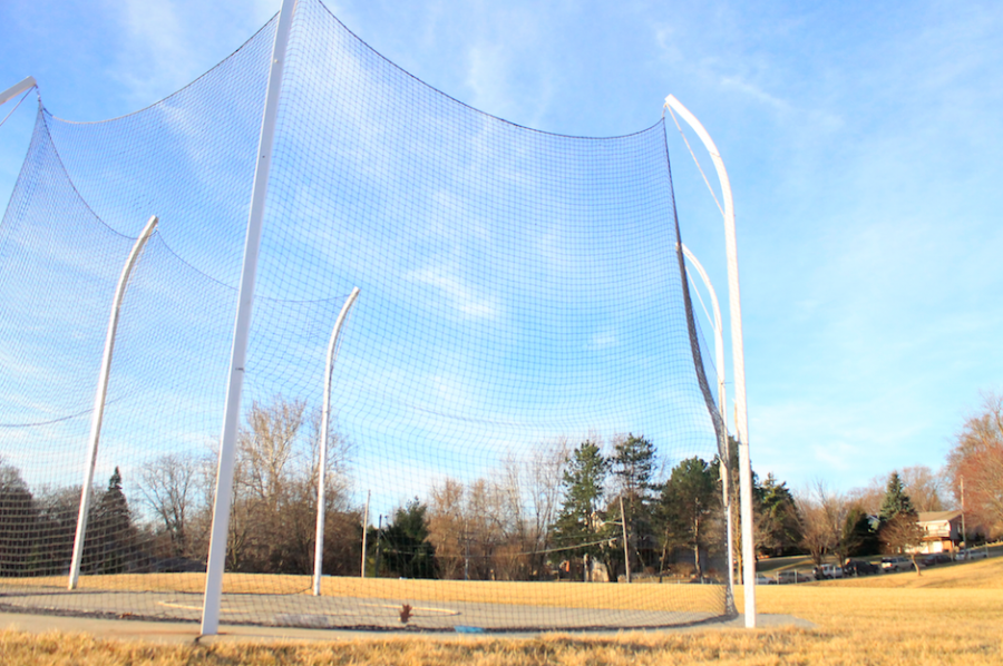 Senior+Todd+Pursel+fixed+the+discus+poles+to+hold+up+the+safety+net.+Pursel+saved+the+school+%244000.+Photo+by+Jace+Wieseler