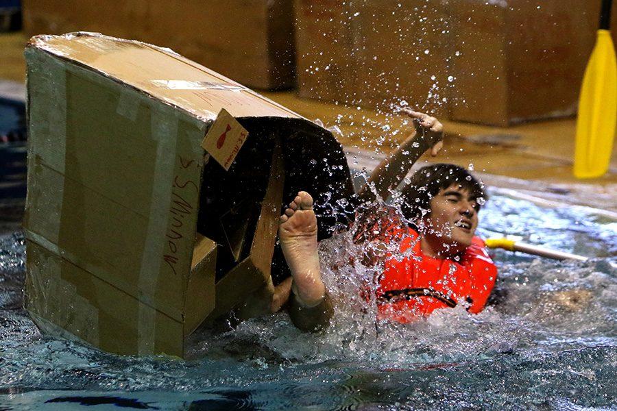 Tech system students attempt to float a boat