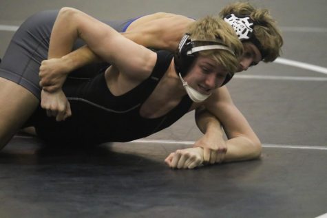 Grueling Practices, Competition Helps Wrestling Team Succeed