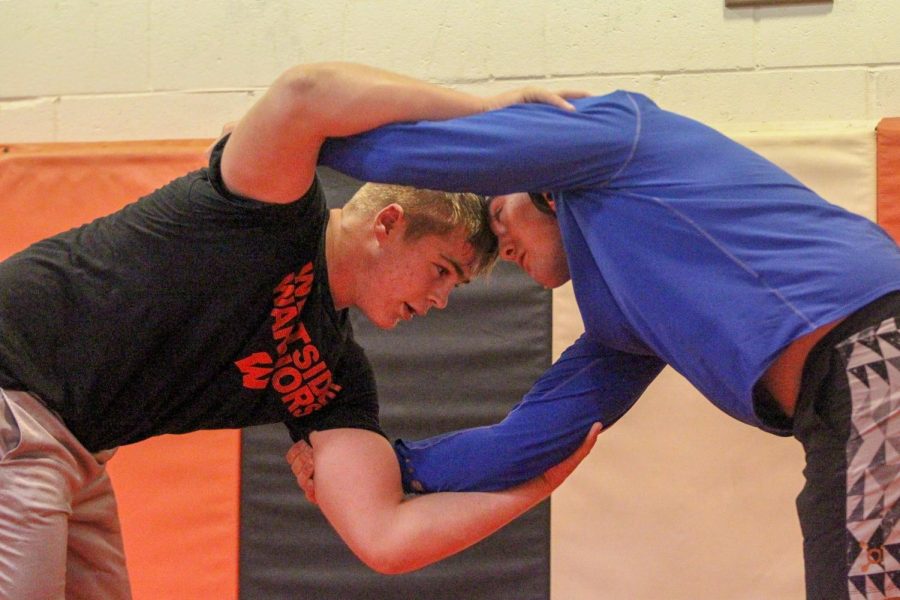 Sophomore Cade Haberman goes head-to-head with a teammate while preparing for the tournament this week.