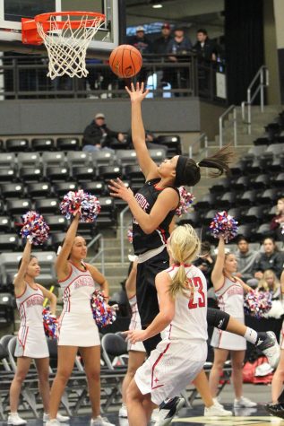 Girls Basketball Team Honors Teammate at Game