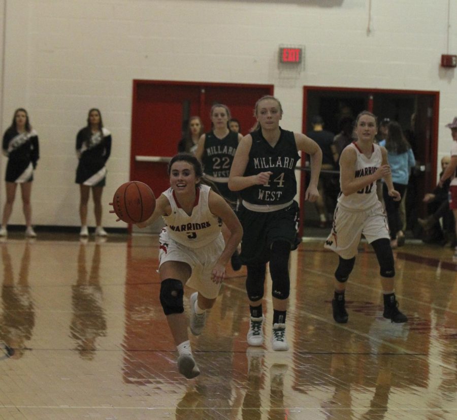 Senior Ryley Nolin chases after a ball during her junior year of her career at Westside.