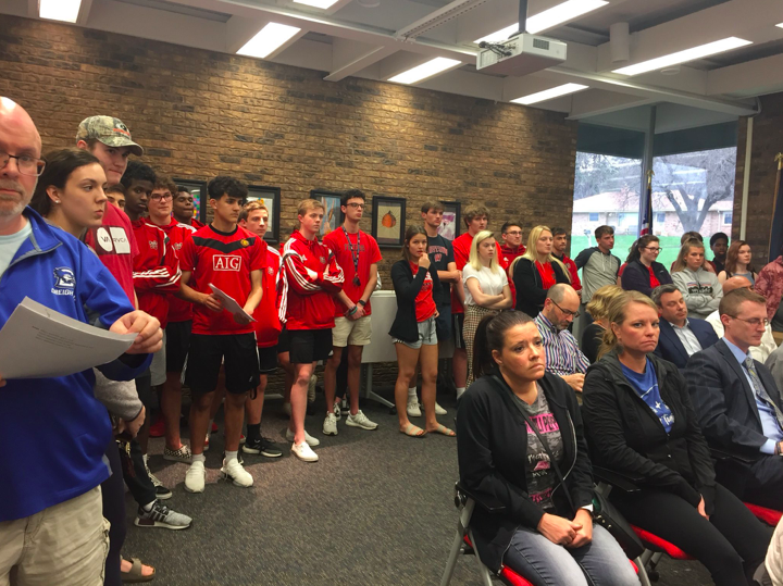 Members of the Westside boys soccer team, along with other members of the student body, stood at the ABC Building on Monday in support of John Brian.