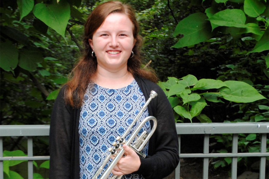 Senior Ashleigh Madsen poses with her trumpet.
