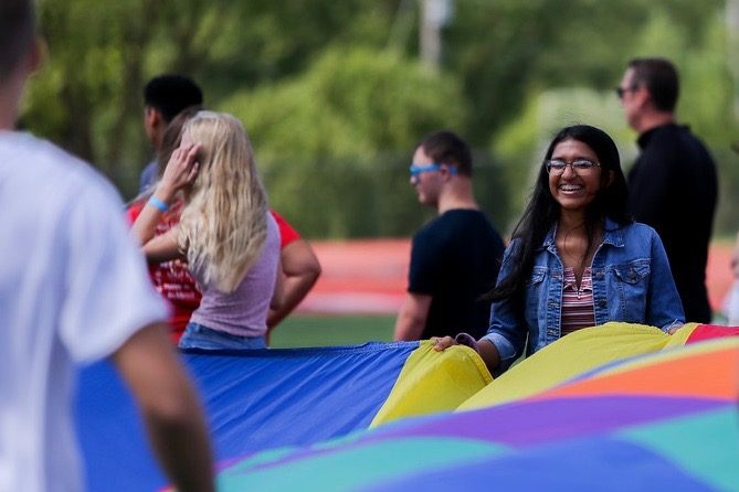 Freshmen participate in activities on the football field during their first day of High School.