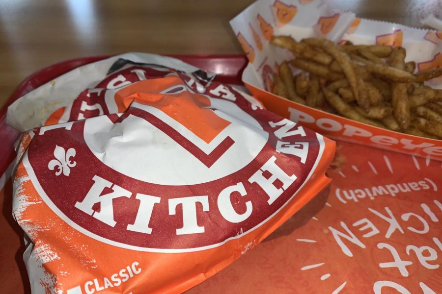 Featured above is Popeyes spicy chicken sandwich with cajun fries.