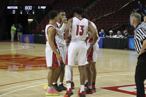 Seniors; Jadin Booth, Carl Brown, P.J Ngambi and Sophomores; Chandler Meeks and Reggie Thomas getting ready for their match up against the Creighton Jr. Jays.