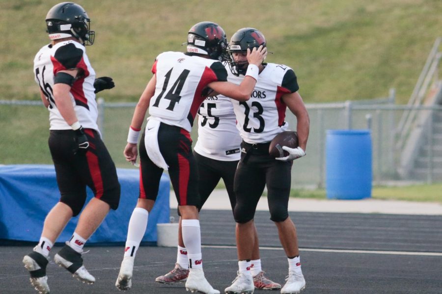 The+connection+between+QB+Kolby+Brown%2C+WR+Grant+Guyett+and+RB+Dominic+Rezac+has+been+a+key+to+Westside%E2%80%99s+success.+The+three+combined+for+392+yards+against+Papillion-La+Vista.+Photo+by+Mary+Nilius