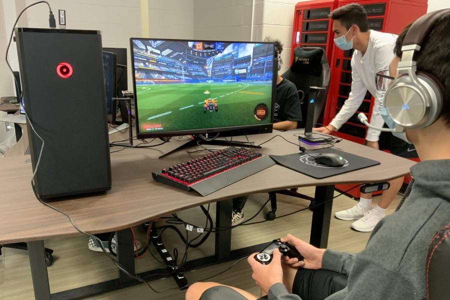 Esports team members practice playing “Rocket League” for an upcoming tournament.