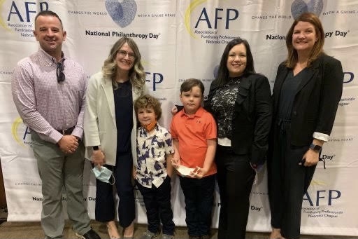 Second grader Ruxin McBride smiles after winning Outstanding Young Philanthropist Award.