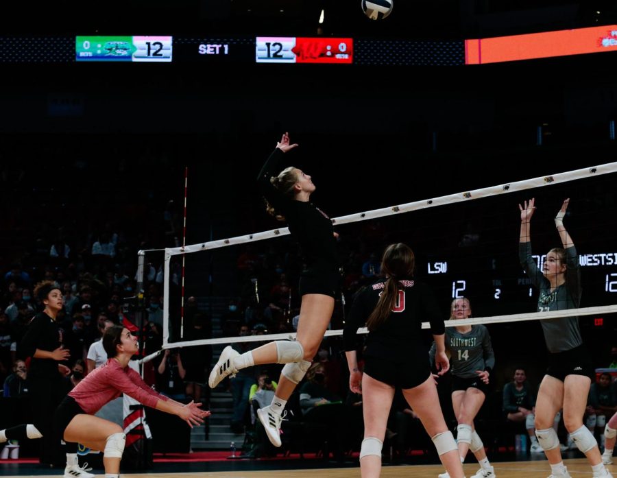 Four-year varsity starter Madilyn Siebler sets up for a kill attempt against Lincoln Southwest in the Class A State Quarterfinals - Photo by Zoe Gillespie