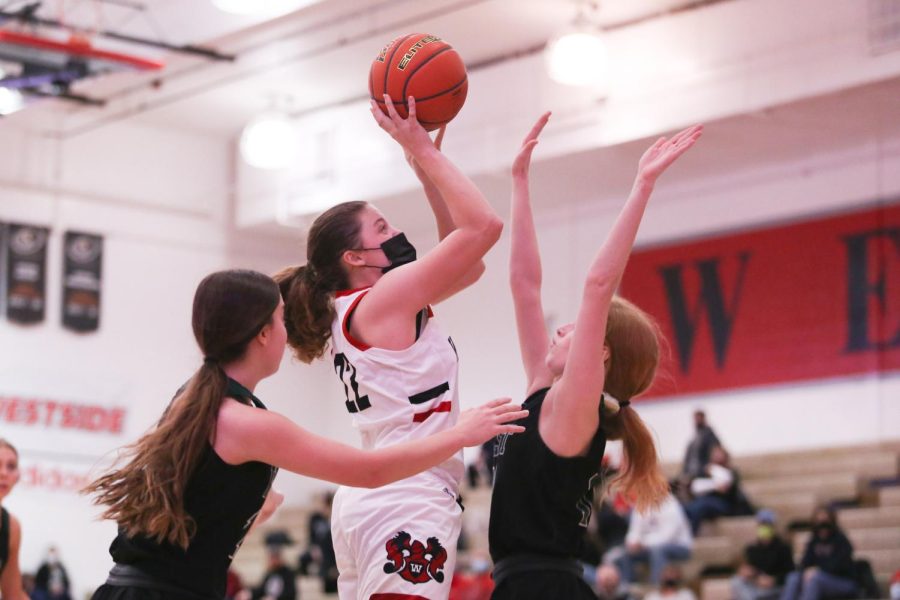 Westsides+Kaitlyn+Hanna+prepares+a+jump+shot+in+a+February+5%2C+2020%2C+47-44+loss+up+against+Millard+West+-+Photo+by+Mary+Nilius+