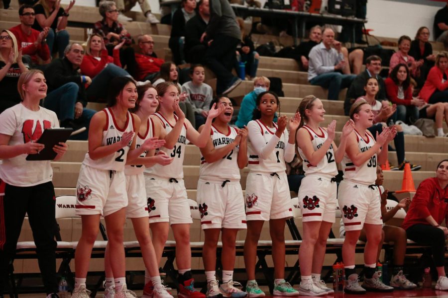 Westside girls basketball celebrates an early season win against Columbia’s - Photo by Eliza Haney