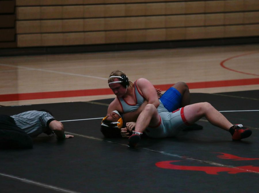 Westside+wrestler+Cole+Haberman+adds+another+pin+on+his+record+at+their+home+dual+against+Omaha+North+-+Photo+by+Zoe+Gillespie