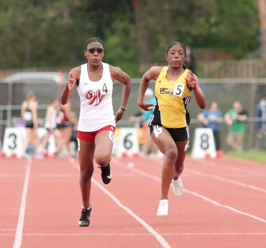 Westside’s junior Lademi Davies sprints at the 2021 State Track Meet