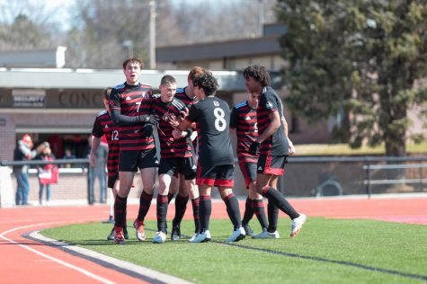 Westside boys soccer celebrates after a Tristan Alvaro goal in their blowout win over Bellevue East