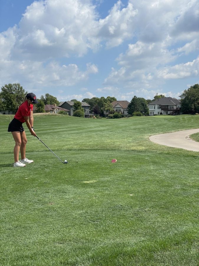 Lining up her putt, junior Carley Brown competes at the Gretna Invite.  The off-season helped me grow so much as a golfer. I worked really hard on my swing and mechanics,” Brown said.
