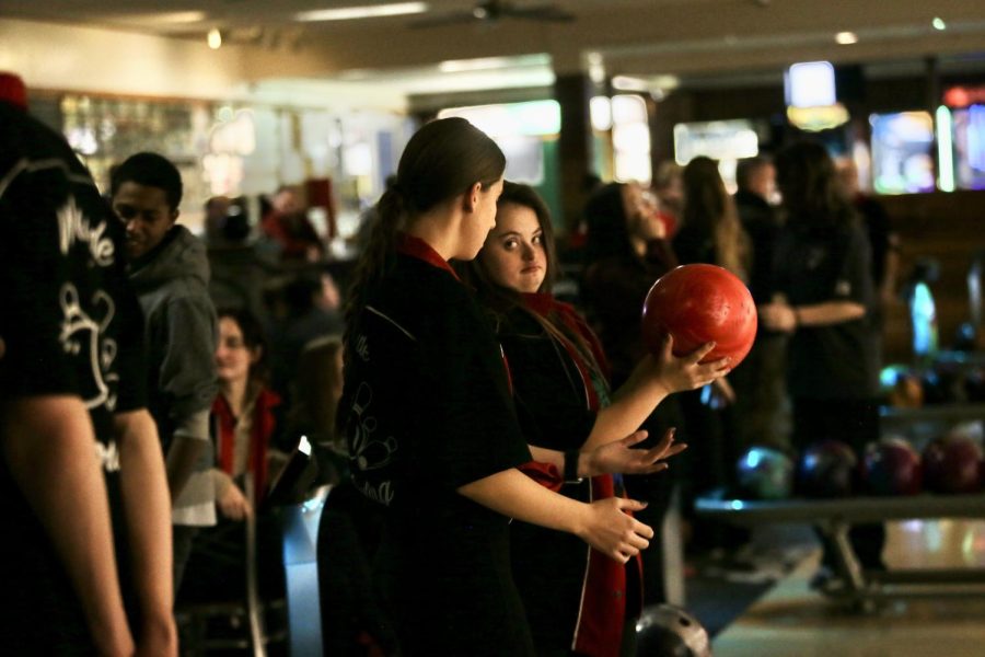 Marissa Thompson and Hailey Kirchhevel talk about strategies to best hit the pins.