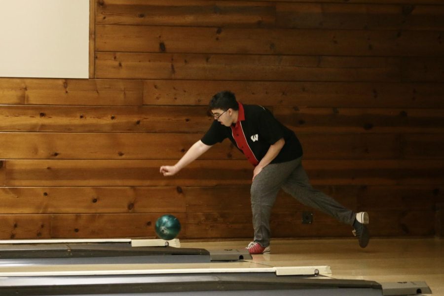 Taevyn Watson uses his good form to hit the pins during the match.
