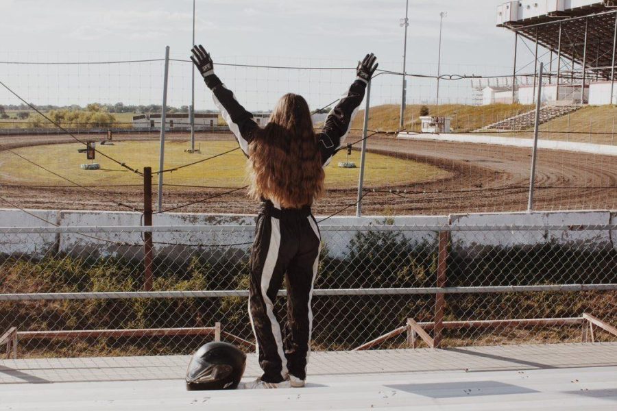 Hailey Kirchhevel celebrates after ranking fifth at Little Sunset Speedway.