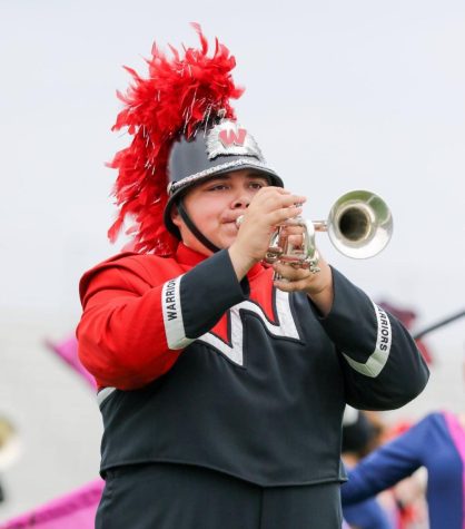 Junior Caden Cervantes plays the trumpet at a Westside band performance. Cervantes recently was awarded a Nebraska Young Artist Award for his trumpet playing skills.