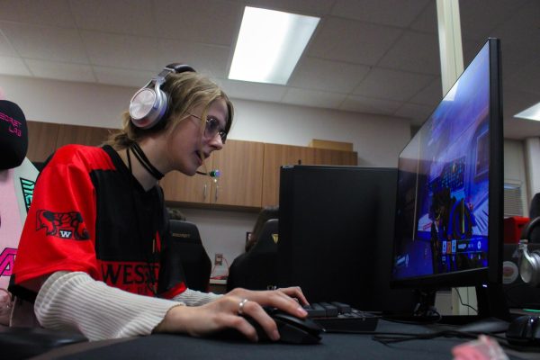 Senior Allison Burnett games at West Campus during an e-Sports meeting on Wednesday, Dec. 6.