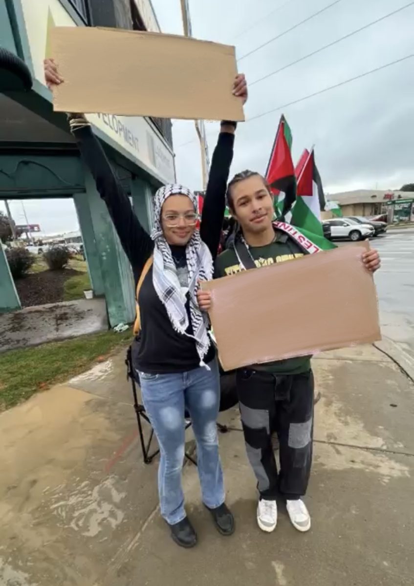 Elise Smith protests in Omaha with her friend Trevon.