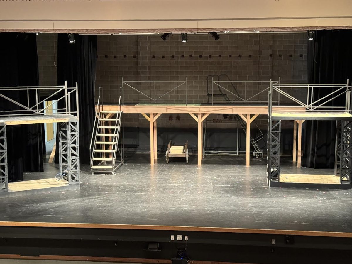 Student Abby Mutum creates the spring musical’s set, Newsies, with her welding skills.