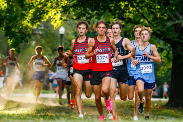 Boys cross country team takes fourth at UNK Invite