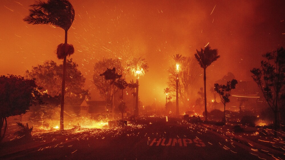 California wildfires escalate as thousands evacuate